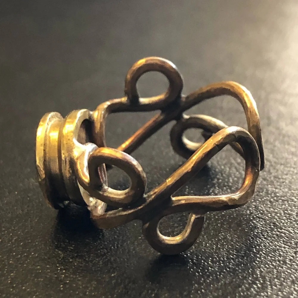 Vintage handmade hammered brass bullet primer ring